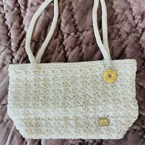 The Sak cream clutch